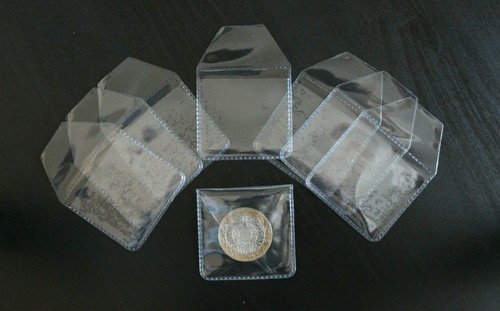 Clear plastic coin holders - coin,