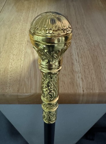 Ornate gold walking cane - walking,