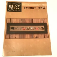 Spooky Row by Brent Creek, halloween, pumpkin skulls cross stitch chart sampler