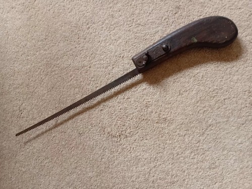 Antique key hole hand - hole, saw