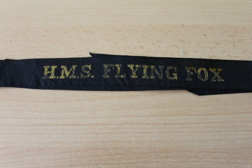 Flying fox cap tally - h.m.s,