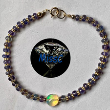 9CT GOLD TANZANITE AND FIRE