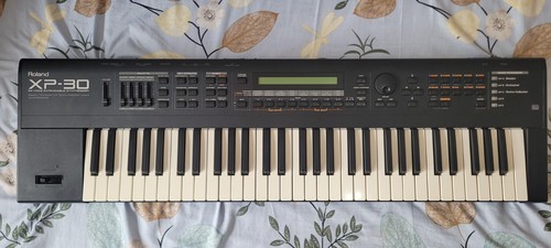Roland synthesizer - roland,