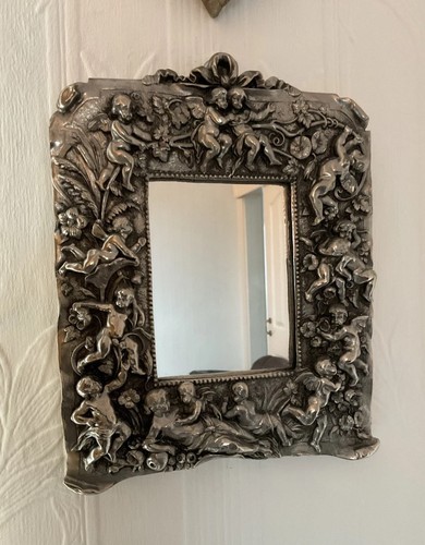 Ornate cherub wall mirror - wall,
