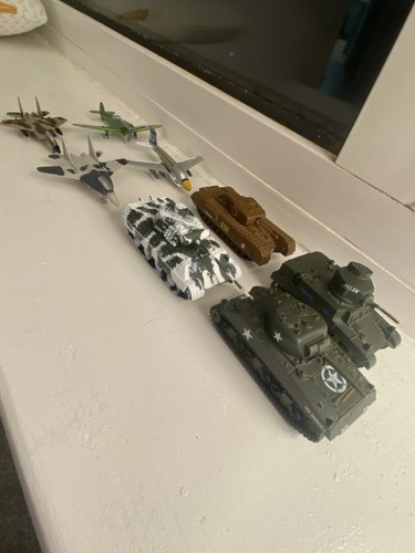 Toy tanks and fighter - tanks,