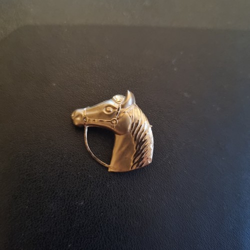 Equestrian hallmarked 375 - equestrian,