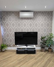 Panasonic air source heat pump system installed nationwide 7 year warranty