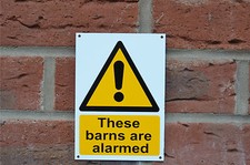THESE BARNS ARE ALARMED A6
