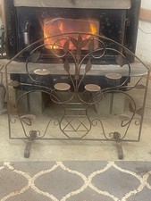fire place screen with candle