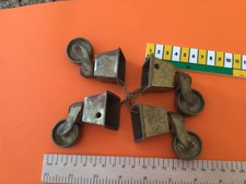4 Vintage Brass Cup Castors