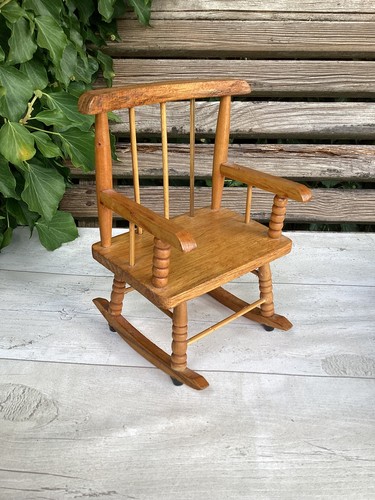One wooden rocking chair - rocking,