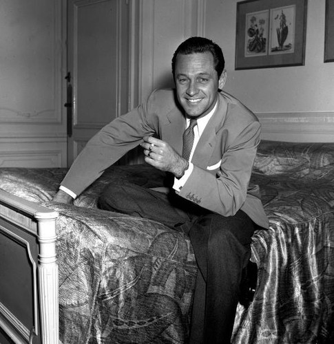 William holden sitting bed - holden,