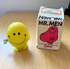 ZC430:   Marx Toys Vintage Mr Men Clockwork Walking Toys 'Mr Happy'