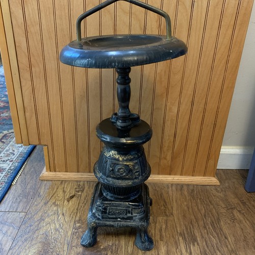 Vintage potbelly stove smoking