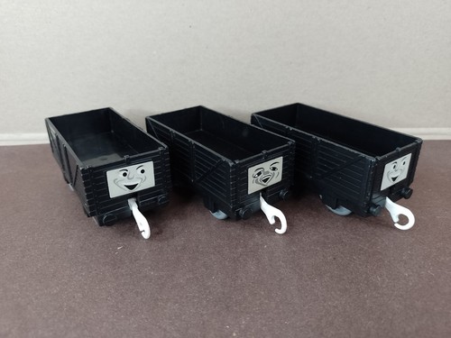 Three black troublesome trucks - troublesome,