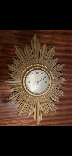 This sunburst wall clock - sunburst,