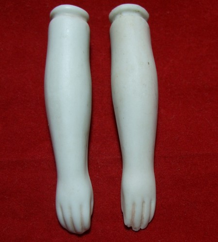 Antique china doll - spoon, arms