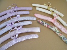 Covered clothes hangers x 10.