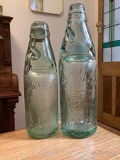 Lovely pair of COVENTRY Codd Bottles Pictorial
