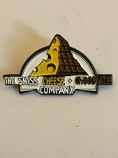 THE SWISS CHEESE AND CHOCOLATE COMPANY PIN BADGE 