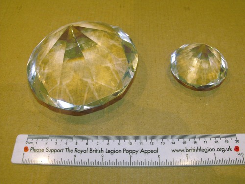 Two clear crystal - , paper