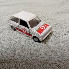 Corgi Juniors - J107 Austin Mini Metro - White, Red & Gold