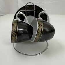Pair Of Black & Gold Cup &