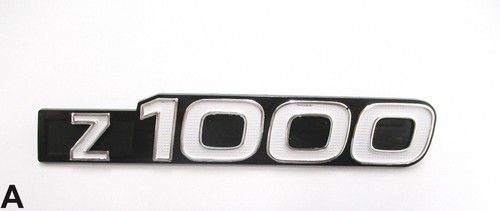 Side cover emblem - side,