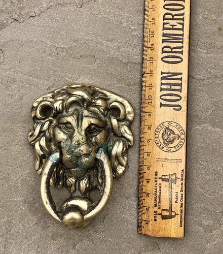 Brass lion head door - head, knocker