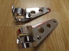 Powerite universal headlight brackets in silver or black