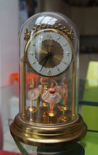 RANELLA small clock with rotating ballerinas under glass dome