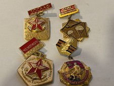 COLLECTION OF 4 SOVIET BADGES
