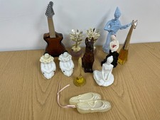 A lovely collection of 12 Avon