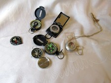 A COLLECTION OF VINTAGE COMPASS
