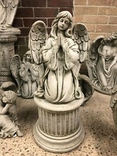 Angel praying with plinth
