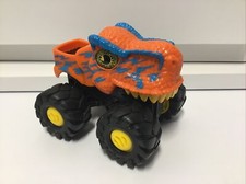 Orange Dino Valley monster truck, friction car, dinosaur, jurassic