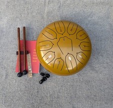 Gold steel tongue drum 10 inch 11 notes with carry case, mallets and music book.