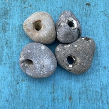 Four large  Natural Hag Stones