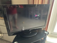 LG 32inch Black TV with Remote and TV Stand