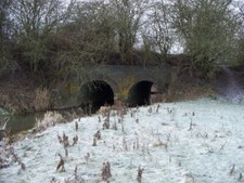 Photo 6x4 River under railway Kingham The River Evenlode passes under the c2009