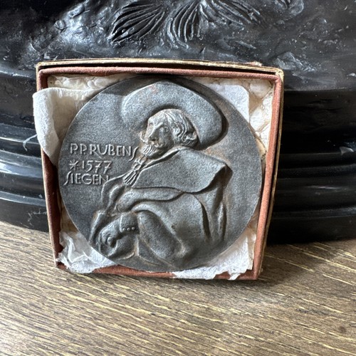 Cast iron plaque commemorating