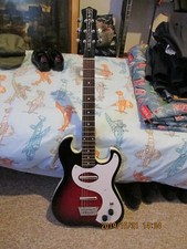 Danelectro '63 guitar in new con'd, buyer to arrange courier or collect free