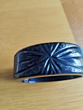 Vintage carved black bakelite
