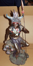 ACADEMY NATIVE AMERICAN  INDIAN  STATUE SITTING ON ROCK WITH SPEAR /SHIELD 35CM