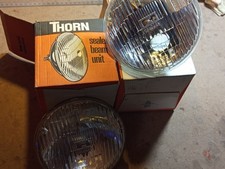 Pair of NOS/ Boxed Thorn 5¾ Halogen Sealed Beam units. 
