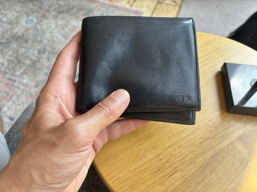 Tumi black leather - black,
