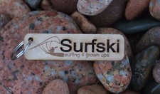 Surfski keyring, handcrafted in wood, lazer cut "Surfski surfing 4 grown ups"  