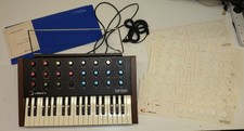 Jex SX1000 Vintage Synthesizer + overlay cards, owners manual, music stand & box