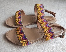 A Brand New Pair Of Beaded