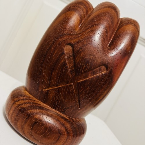 Kaws giswil more wooden hand - kaws,